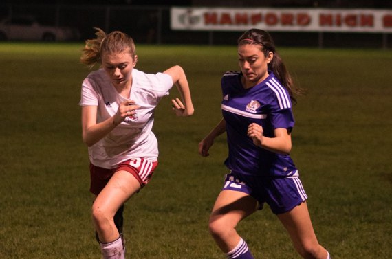 No playoffs this year for Tiger soccer squads as another season ends Brianna Navarrete keeps her eyes on the ball in Wednesday game against Hanford.